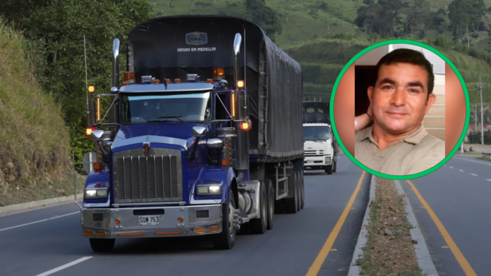 Jairo Adelso Aparicio Reyes, camionero liberado tras 90 días de secuestro en el sur del Cesar, junto a un camión de carga.