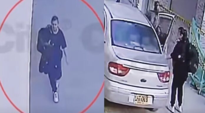 Captura de cámara de seguridad que muestra a Yulixa Toloza caminando y subiendo a un vehículo gris tras su procedimiento en una clínica de Bogotá.