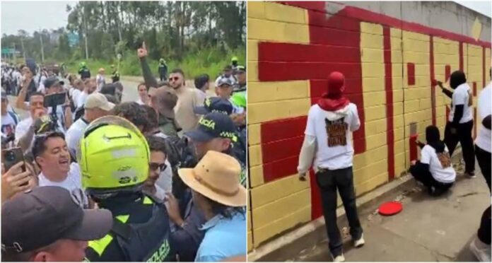 Polémica política en Antioquia por un grafiti cerca de finca de Uribe alusivo a las víctimas de falsos positivos documentados por la JEP.