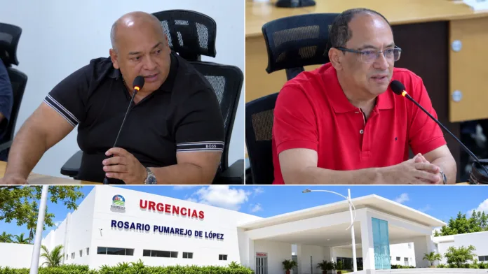 Diputados Popo Barros y Jesús Suárez durante la sesión de la Asamblea, junto a la fachada del Hospital Rosario Pumarejo de López.
