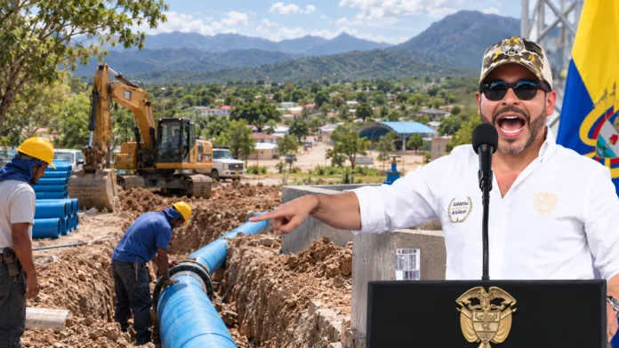 Abelardo De La Espriella junto a las obras del acueducto de La Junta y el paisaje de la Sierra Nevada